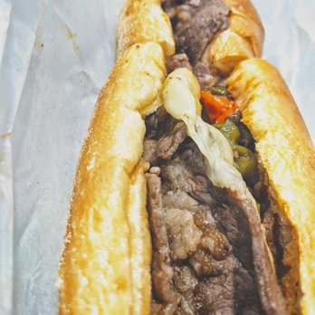 Oregon Steaks - What's you are viewing is a very authentic Cheesesteak with a delicious roll . It is provolone wit, and has roasted long hots on it - Cheesesteaks Near Me - Philadelphia, Pennsylvania