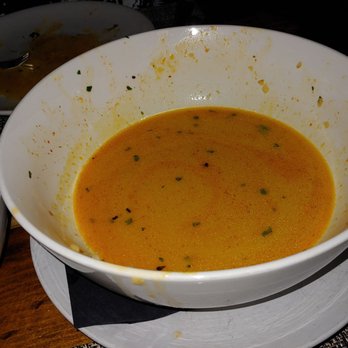 FlatIron Kitchen & Taphouse - The tasty broth under the mussels... Or at least what was left of it - New American Near Me - Davidson, North Carolina
