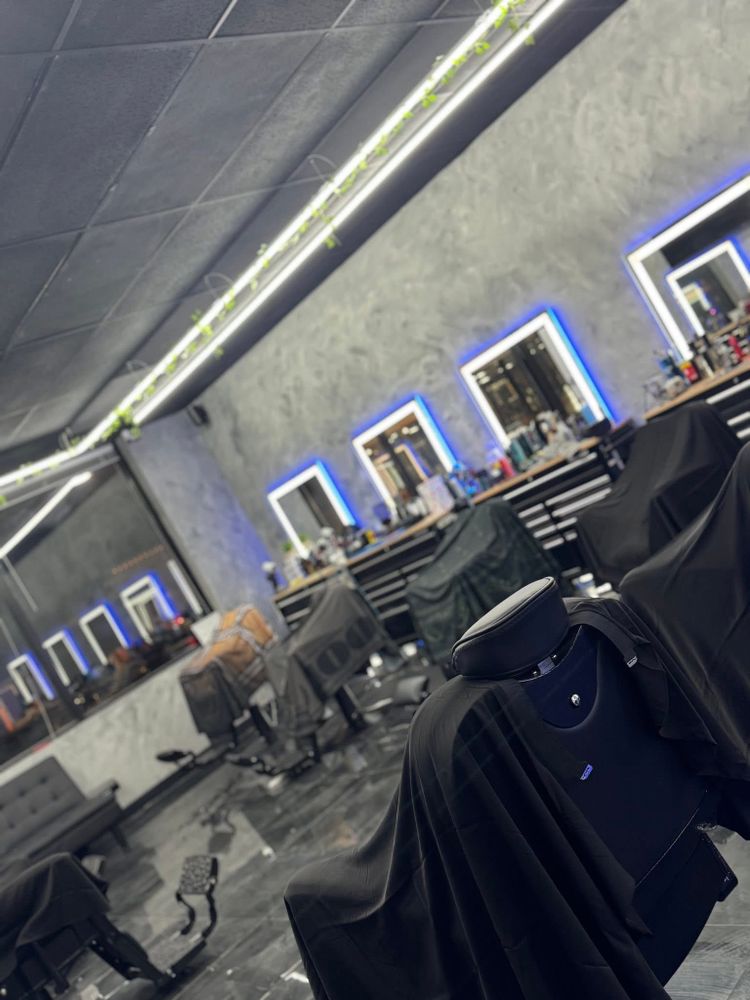 Visionary Barber Lounge Logo