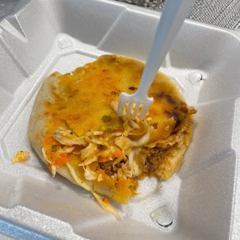 El Arco Pupusas Restaurant - Chicherone con queso pupusa with spicy cabbage on top - Latin American Near Me - San Marcos, Texas El Arco Pupusas Restaurant - Chicherone con queso pupusa with spicy cabbage on top - Latin American Near Me - San Marcos, Texas