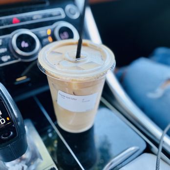 Coffee Guy Cafe - Regular house blend ice coffee with almond milk topped with a little half & half for some creamy dreamy :)' - Coffee & Tea Near Me - Pensacola, Florida