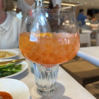Morso - Strawberry spritz  with orange rind accent - Italian Near Me - Boulder, Colorado