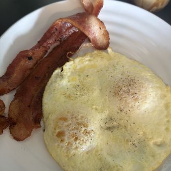 Caramelo Cafe - over easy eggs and two strips of bacon - Breakfast & Brunch Near Me - La Puente, California Caramelo Cafe - over easy eggs and two strips of bacon - Breakfast & Brunch Near Me - La Puente, California