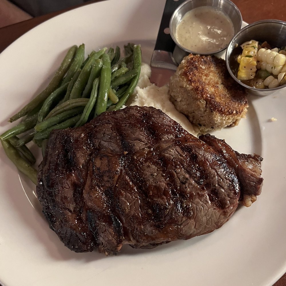 Blue Marlin - Ribeye, rare, with crab cake. - Seafood Near Me - Columbia, South Carolina