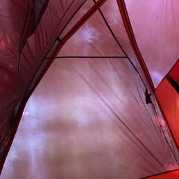 The trains passing by made it possible for me to spend all night studying the tent's ceiling structure. The trains passing by made it possible for me to spend all night studying the tent's ceiling structure.