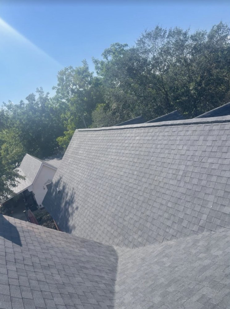 Slide of Tyndal Roofing