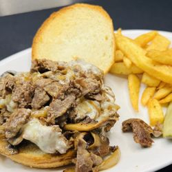 Island Hotel & Restaurant - Shaved Steak Sandwich with fries- bar special