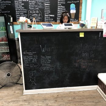 MooMcGinn's Magic Creamery - a woman behind the counter - Ice Cream & Frozen Yogurt Near Me - Rincon, Georgia