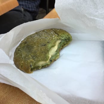 Cafe Dulce - Inside of the green tea donut. This bad boy is an Asian fried style of bread. Super greasy and has sprinkled sugar all over it. - Coffee & Tea Near Me - Los Angeles, California Cafe Dulce - Inside of the green tea donut. This bad boy is an Asian fried style of bread. Super greasy and has sprinkled sugar all over it. - Coffee & Tea Near Me - Los Angeles, California