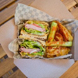 La Reina Michoacana - Ham or turkey torta with a side of Mexican chips. Chips sold separately