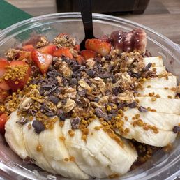 Acai bowl with strawberries, bananas, honey, cacao nibs, bee pollen, and granola.   10/10