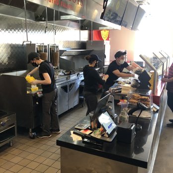 The Halal Guys - Blur of action where the magic happens. Just like the street cart guy. - Mediterranean Near Me - Southlake, Texas