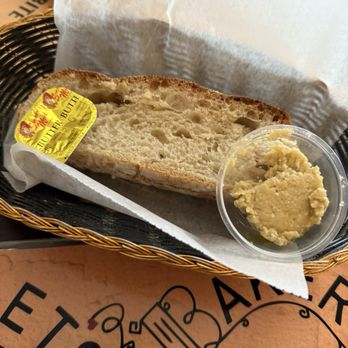 Romeo & Juliet Cafe - Fresh baked bread with garlic and butter on side - Italian Near Me - Buffalo, New York Romeo & Juliet Cafe - Fresh baked bread with garlic and butter on side - Italian Near Me - Buffalo, New York