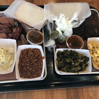 Gatlin's BBQ - BBQ sausage (sliced), sliced brisket, baby back pork ribs, potato salad, baked beans, greens, mac-n-cheese, sliced white bread, & sweet tea. - Barbeque Near Me - Houston, Texas Gatlin's BBQ - BBQ sausage (sliced), sliced brisket, baby back pork ribs, potato salad, baked beans, greens, mac-n-cheese, sliced white bread, & sweet tea. - Barbeque Near Me - Houston, Texas