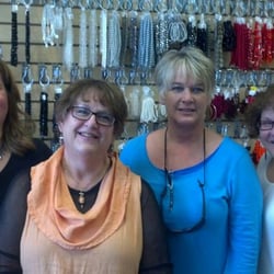 Stony Creek Bead - Owner Jenn Schwartzenburger, Sue Schwartzenburger, Shelly Pleines and Liz Thompson in front of the "Wall of Beads"