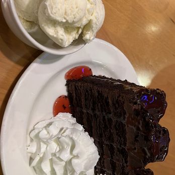 The Fish Peddler - 7 later chocolate cake with brownie crumbs and raspberry sauce - Seafood Near Me - Tacoma, Washington The Fish Peddler - 7 later chocolate cake with brownie crumbs and raspberry sauce - Seafood Near Me - Tacoma, Washington