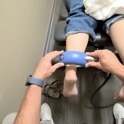 Juke Chiropractic & Sports Rehab - Shockwave therapy on the Achilles Tendon