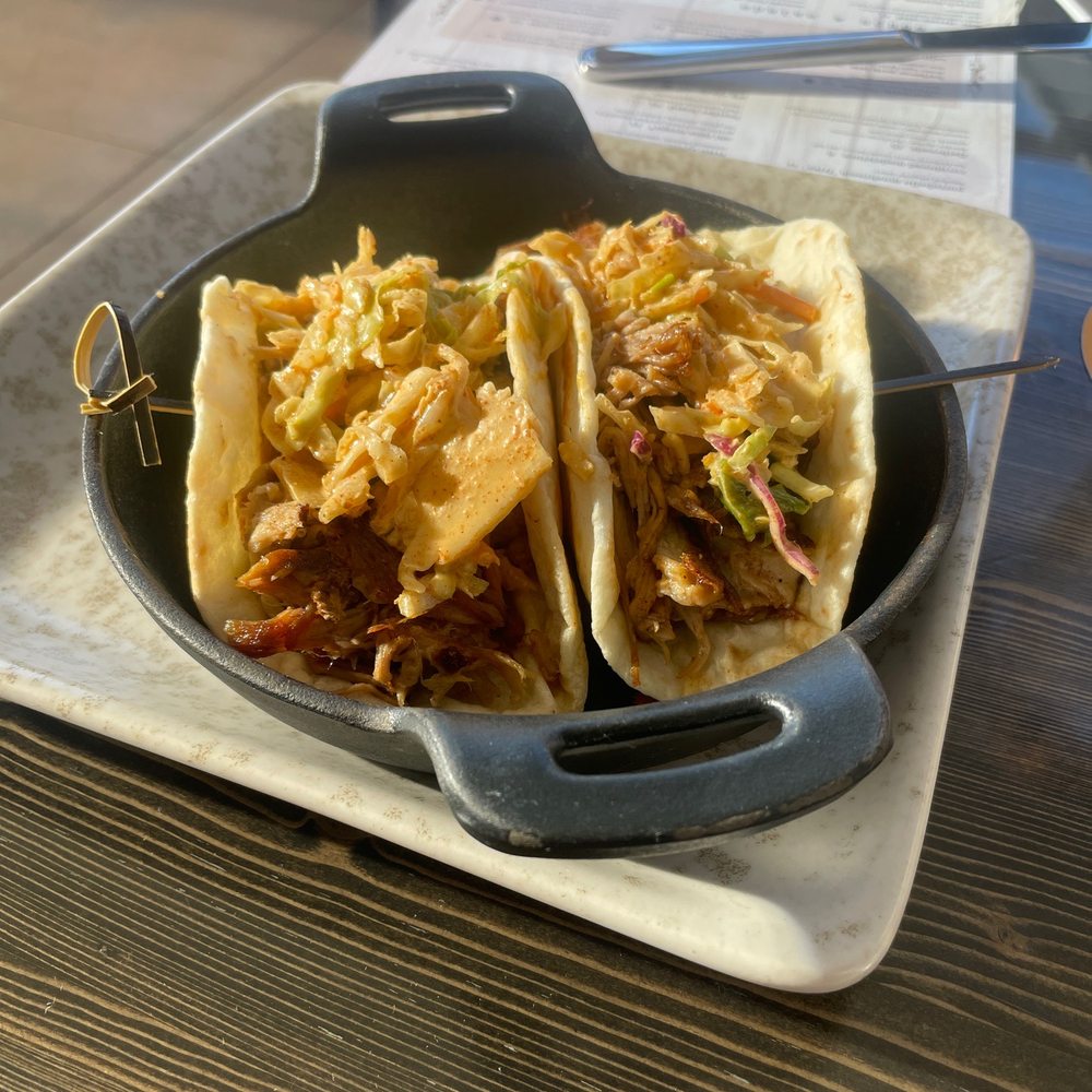 Bosscat Kitchen & Libations - Pig picking tacos - Bars Near Me - Orange, California Bosscat Kitchen & Libations - Pig picking tacos - Bars Near Me - Orange, California