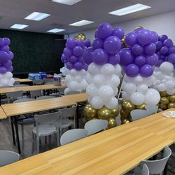 Kids City - Kapolei - Kids City staff prepare the balloon columns the night before