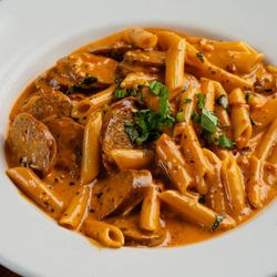 Joe's Pasta-N-Pizza - Sausage Arrabbiata
Penne pasta in a spicy pink sauce with sliced Italian sausage