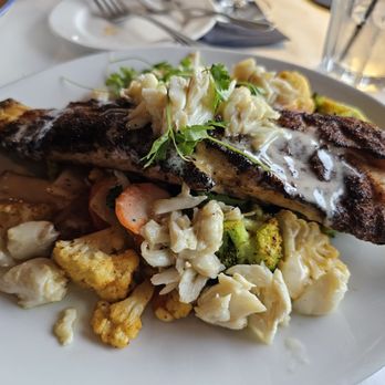 Rusty Scupper - Chesapeake Rockfish w/lump crab & vegetables and calamari appetizer. - Seafood Near Me - Baltimore, Maryland