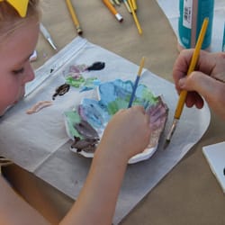 AB Fine Art Studio - private lesson for a young student.  She is glazing a leaf dish she made out of clay.