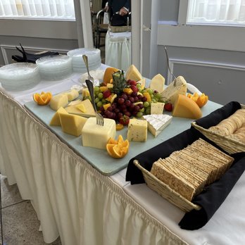 Li Greci's Staaten - cheese, crackers, and fruit on a table - New American Near Me - Staten Island, New York Li Greci's Staaten - cheese, crackers, and fruit on a table - New American Near Me - Staten Island, New York