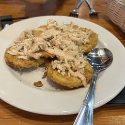 Crispy fried green tomatoes topped with crab