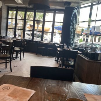 Village Social - Kitchen & Bar - Great time to go is around 4. It was nice to sit in a booth and have the street view. Such a nice ambiance! - New American Near Me - Rye, New York