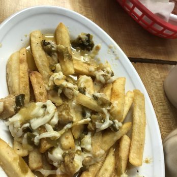 Fat Boy - Chencho Fries with green chili & cheese. This is after we started munching. - Burgers Near Me - Las Vegas, Nevada