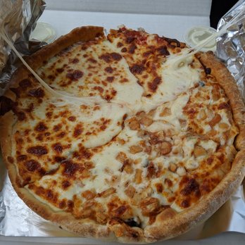 Lou’s LaGrotto - Deep dish - Pizza Near Me - Peru, Illinois Lou’s LaGrotto - Deep dish - Pizza Near Me - Peru, Illinois