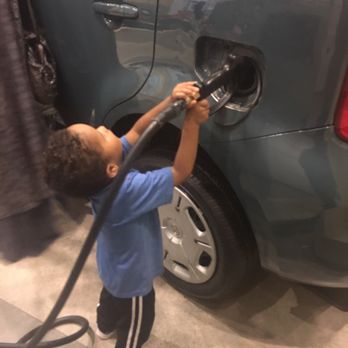 Please Touch Museum - My son putting gas in a car. - Museums Near Me - Philadelphia, Pennsylvania