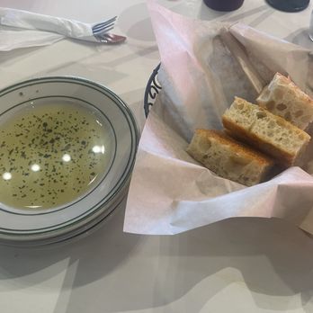 Mandola’s Italian Kitchen - Bread and a nice oil/herb to dip the bread in. I add in some garlic and Pepper flakes. - Italian Near Me - Odessa, Florida Mandola’s Italian Kitchen - Bread and a nice oil/herb to dip the bread in. I add in some garlic and Pepper flakes. - Italian Near Me - Odessa, Florida