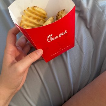 Chick-fil-A - ows a person holding a box of fries - Fast Food Near Me - Jacksonville, Florida