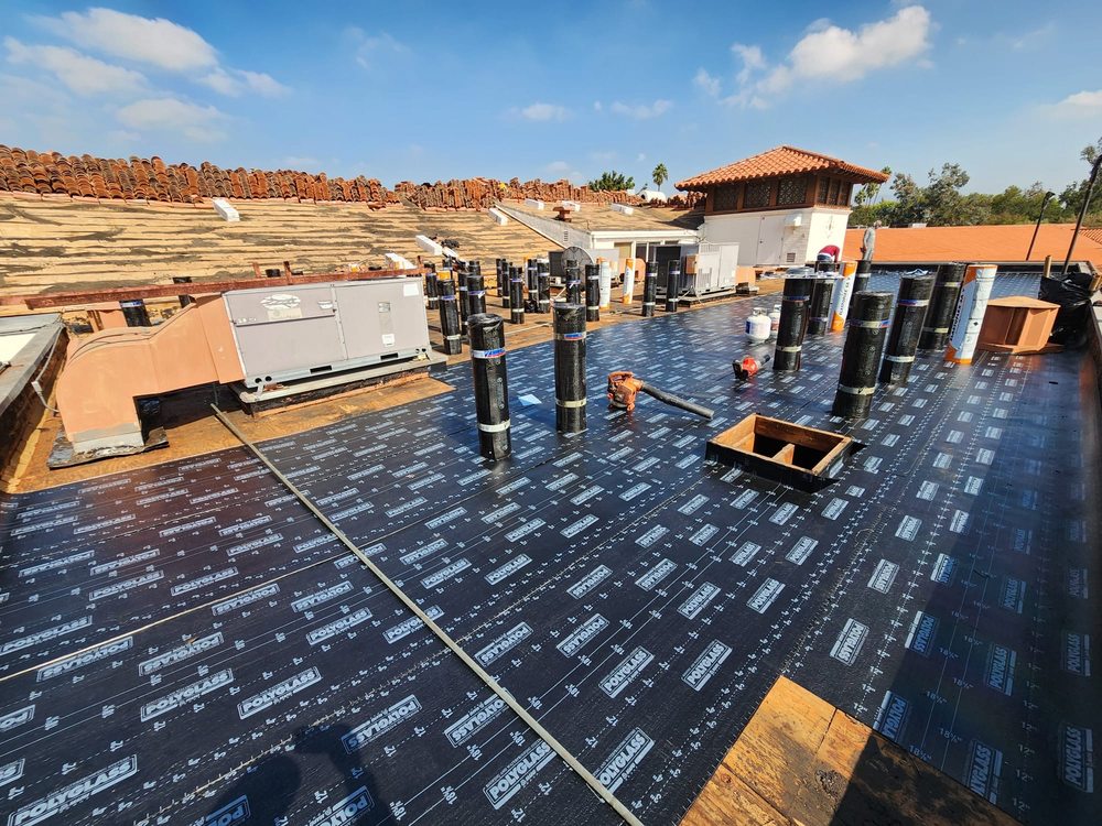 Slide of iHeart Roofing