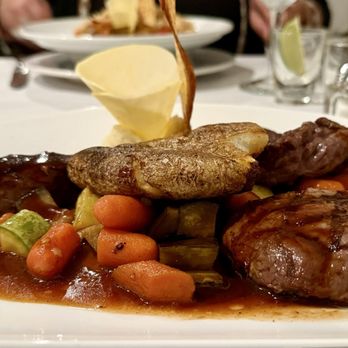 The Black Bear Bistro - Ostrich, Elk and Kangaroo medallions with smashed potato and veggies. - New American Near Me - Algonquin, Illinois The Black Bear Bistro - Ostrich, Elk and Kangaroo medallions with smashed potato and veggies. - New American Near Me - Algonquin, Illinois