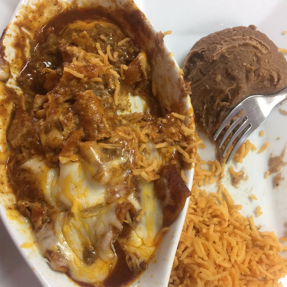Stockyard Cafe - Beef Enchiladas with beans and rice - Mexican Near Me - Aylmer, Ontario Stockyard Cafe - Beef Enchiladas with beans and rice - Mexican Near Me - Aylmer, Ontario