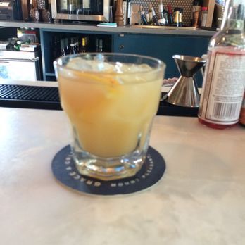 Grace & Grit - Proprietor's Punch (bourbon, rum, pineapple, spices and Earl grey syrup) - Southern Near Me - Mount Pleasant, South Carolina