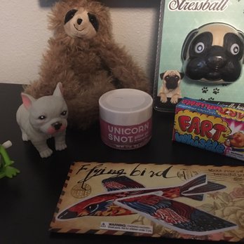 Doodlet's - Wind up toys, sloth, squishy pug head, and some unicorn snot. Score! - Toy Stores Near Me - Santa Fe, New Mexico