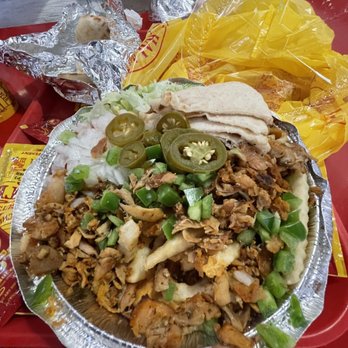 The Halal Guys - Limited time chix schwarma over fries platter - Halal Near Me - Cerritos, California The Halal Guys - Limited time chix schwarma over fries platter - Halal Near Me - Cerritos, California