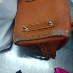 Platos Closet - Mold on old Dooney and Bourke handbag priced at $30.
