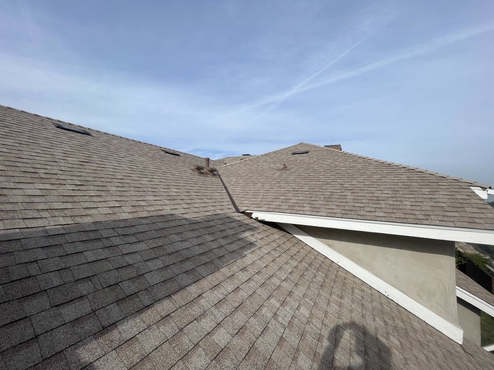 Slide of Dilligent Roofing