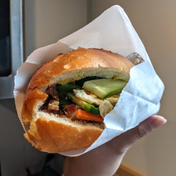 Banh Mi Deluxe - BBQ Pork Bahn Mi with an egg - Vietnamese Near Me - Seattle, Washington Banh Mi Deluxe - BBQ Pork Bahn Mi with an egg - Vietnamese Near Me - Seattle, Washington