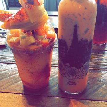 SÍPP Cafe - This is the mangoniada with the Thai tea. The bottle is cute and only for $12.00 - Fast Food Near Me - Glendale, Arizona