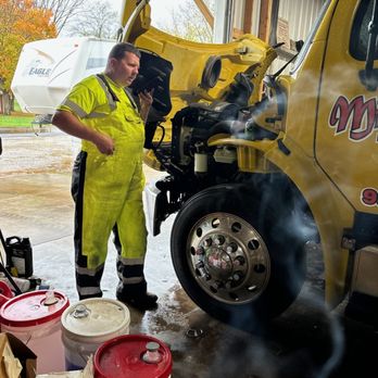 Mid-State Towing - This is our son-in-law Brian, proudly servicing the company trucks. - Towing Near Me - Hillsboro, Tennessee Mid-State Towing - This is our son-in-law Brian, proudly servicing the company trucks. - Towing Near Me - Hillsboro, Tennessee