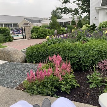 Bar Harbor Inn - Flower garden and pool entrance - Hotels Near Me - Bar Harbor, Maine