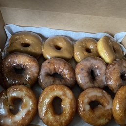 Maple Syrup, Blueberry, Old Fashion Glazed. Maple Syrup, Blueberry, Old Fashion Glazed.