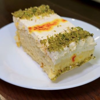 Oud Coffee & Cafe - Saffron Milk Cake - Coffee & Tea Near Me - Chicago, Illinois Oud Coffee & Cafe - Saffron Milk Cake - Coffee & Tea Near Me - Chicago, Illinois