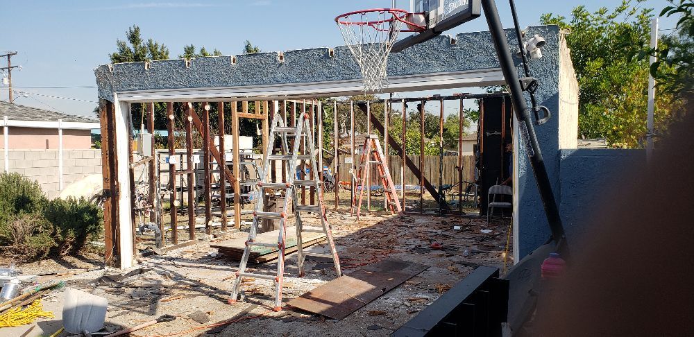 Slide of Alex's Hauling & Demo