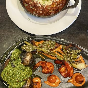 Jesús Latin Grill - Top plate: Chicken Tinga Enchiladas (very salty) Bottom plate: Surf & Turf (delicious, recommend) - Latin American Near Me - Mishawaka, Indiana